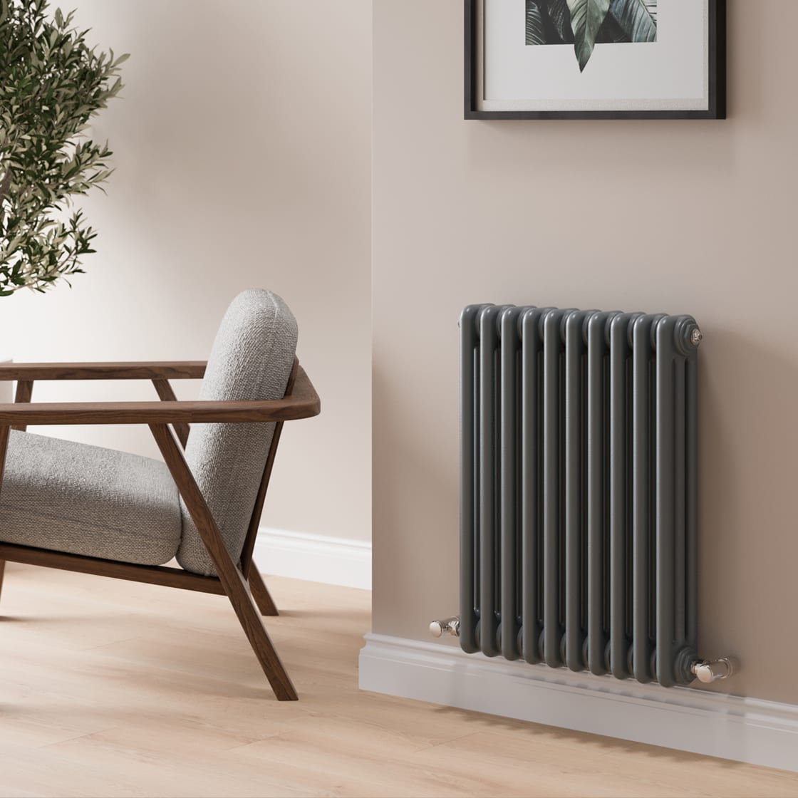 Three column radiator in textured anthracite beside an armchair